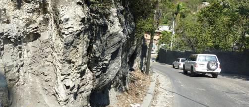Earthquake Resistant Engineering Structures IX 441 Figure 16: Very hard limestone rock of south hills of Port au Prince.