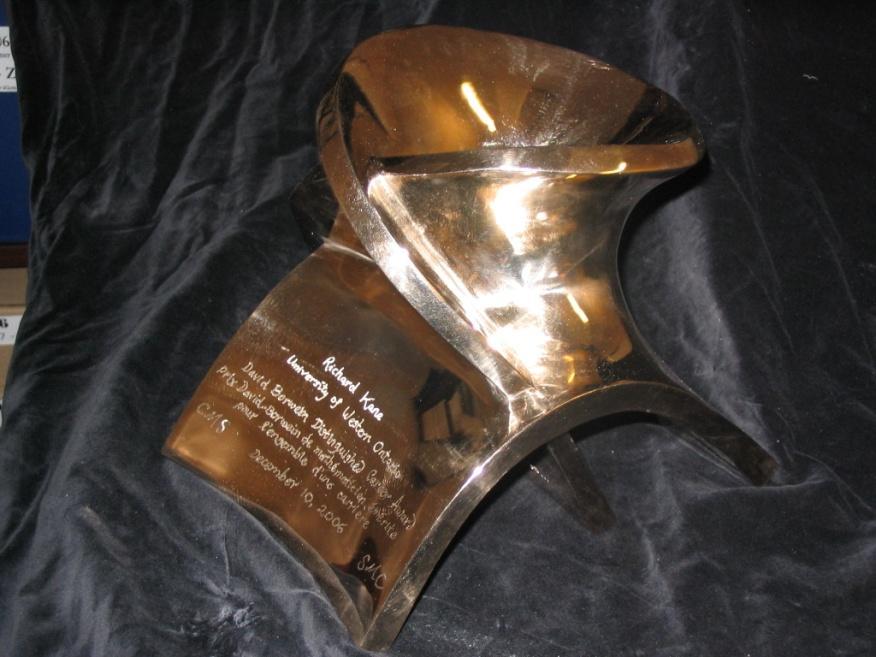 MADELUNG s CONSTANT David Borwein CMS Career Award This polished solid silicon bronze sculpture is inspired by the work of David Borwein, his sons and colleagues, on the conditional series above for