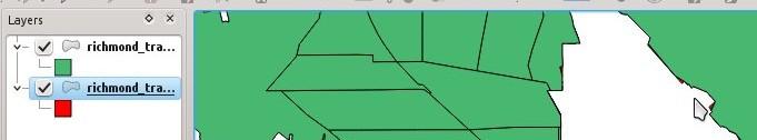 There were only about 50 entities in the shapefile, so I could scroll up and down the calculated area Attribute to remove the shavings from the clipping process.