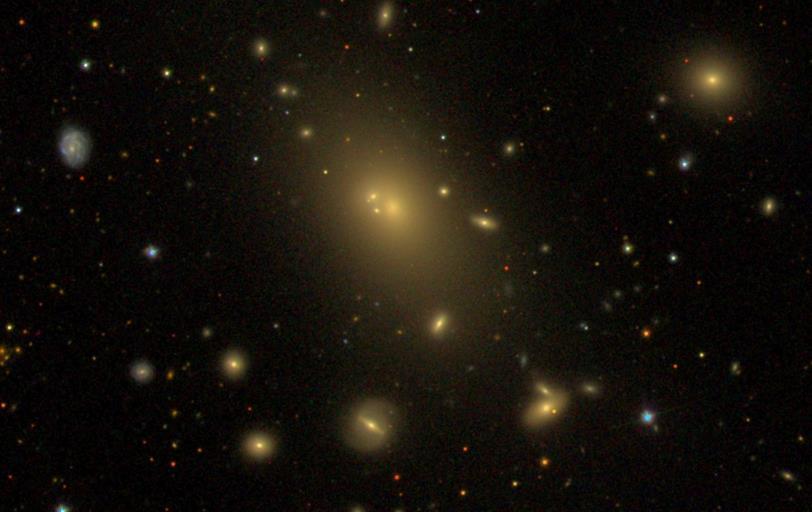 Figure 2.10: NGC 6166, the large galaxy in the centre, is a cd galaxy (Adam Block/NOAO/AURA/NSF). 2.10 Dwarf elliptical galaxies For a review see Ferguson & Binggeli (1994).