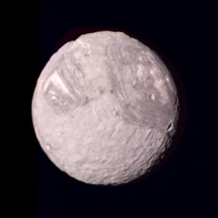 dark hydrocarbon soot Umbriel Ariel Miranda takes the prize for weirdest moon of Uranus Miranda Voyager 2 images of Miranda