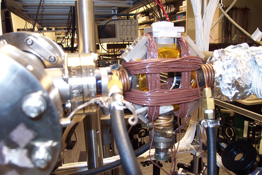 Figure 4.14: TOP coils wrapped around the chamber. Each coil has 20 turns and they are driven by a two-channel audio amplifier. The Quadrupole coils are not shown. 4.5.