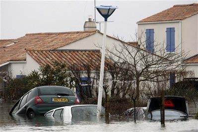 Hurricane Xynthia 2010 in France Flooded houses and cars are seen in La Faute