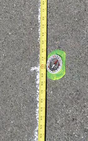If you ve used a compass to find true north, align a tape measure with the side of the compass. Draw a chalk line that s the same length as the north-south axis in your Human Sundial pdf.