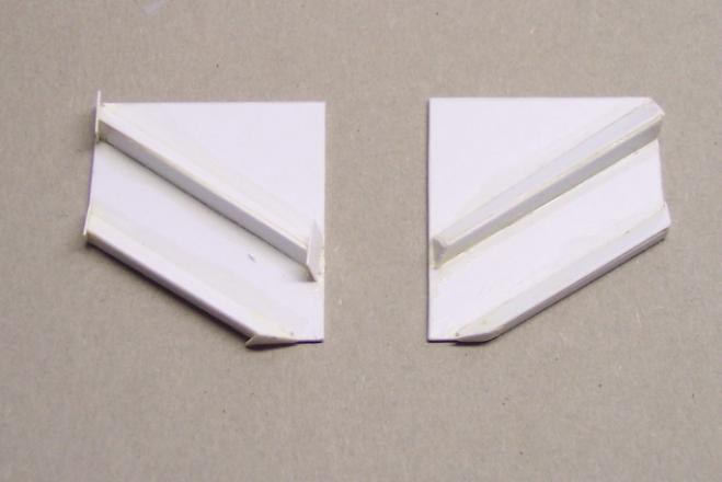 The wings and doors are next. The wings as shown in Figure 13 are cut from 0.030 sheet with the raised ribs, each of which is made from 2 strips of 0.020 sheet. Then I cur a tiny scrap of 0.