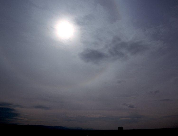 Cirrostratus (Cs) with 22 halo: thin, white, translucent veil either fibrous or smooth in appearance