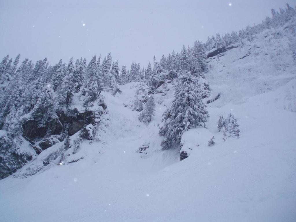 just above skier in left foreground Figure 6.