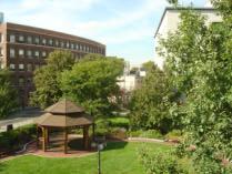 (a) (b) Figure 9. The strong motion array located just behind the gazebo on Northeastern University s Boston campus (a). The location of the four terminal boxes and the dedication granite plaque (b).