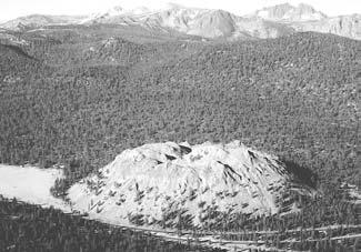 The cinders pile up around the vent into a cone-shaped hill with a bowl-shaped crater in the top. These are called cinder cones.