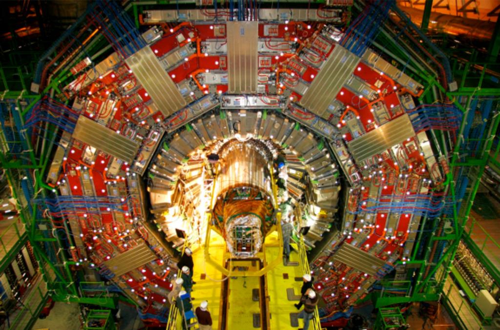 Hadron colliders and the Trigger This explains why these experiments, these highly sophisticated digital cameras, have to be so massive and complex, with tens of millions of channels, reading out