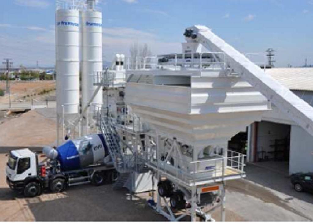 2 System Description The concrete plant where this predictive control system has been integrated consists of four aggregate hoppers, two cement silos, two scales, two additive feeders, a water