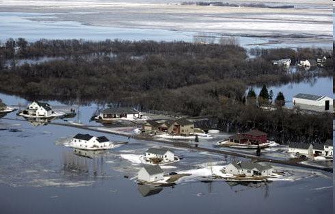 Fargo flooding eases as blizzard pounds region