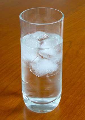 The water molecules in an ice crystal are spaced farther