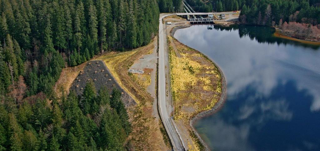 An aerial view of the John Hart Middle Earthfill Dam in British Columbia,