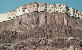 Nonconformity Angular unconformity In a nonconformity, horizontal layers of sedimentary rock overlie older igneous or metamorphic rocks.
