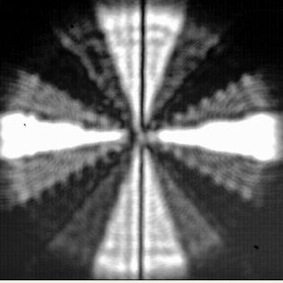 DC-Order of the 18-Section grating viewed through an analyzer at angles of (a) -67.5, (b) -36, (c) -4.