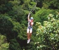 Description of Monteverde Canopy Tour: Zip into Biodiversity Hooked to a zip line, students soar through the forest treetops and see jungle life in the Costa