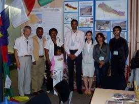 Fig. 10 Poster display of the Kaligandaki and Everest guidebooks, JN50, Tokyo, 2006, with GIGE staff.