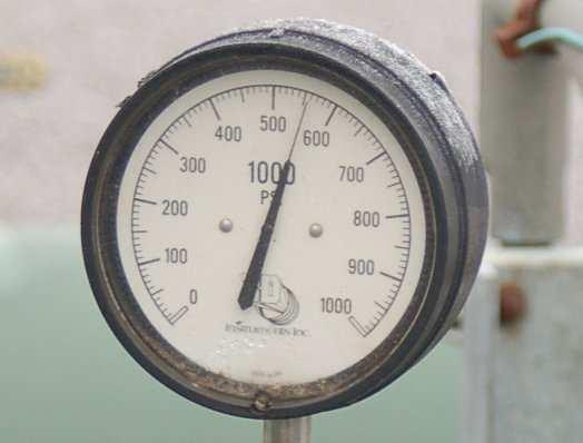 Question 3 Interpret the pressure measurement displayed by this gauge mechanism, assuming a gauge accuracy of ± 0.