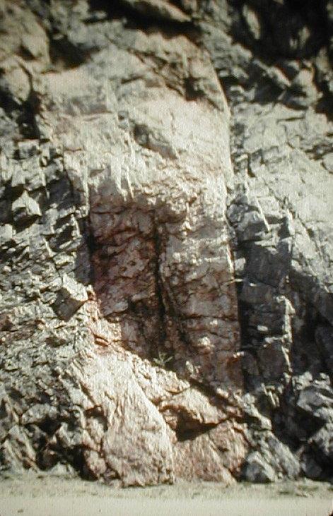 Igneous rocks sometimes flow upwards into cracks