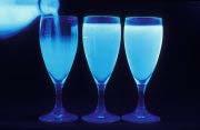 Tonic water contains quinine which fluoresces blue