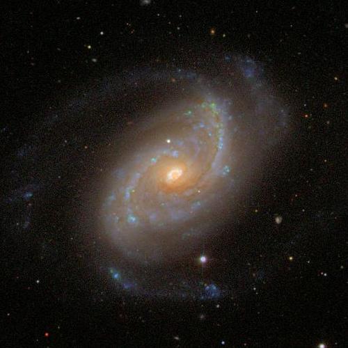 NGC 5248 The brightest galaxy in Bootes, this spiral has a bright core and surrounding haze faintly