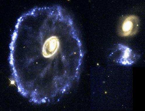 How do astronomers know that the "rim is an immense ring-like structure 100,000 light years