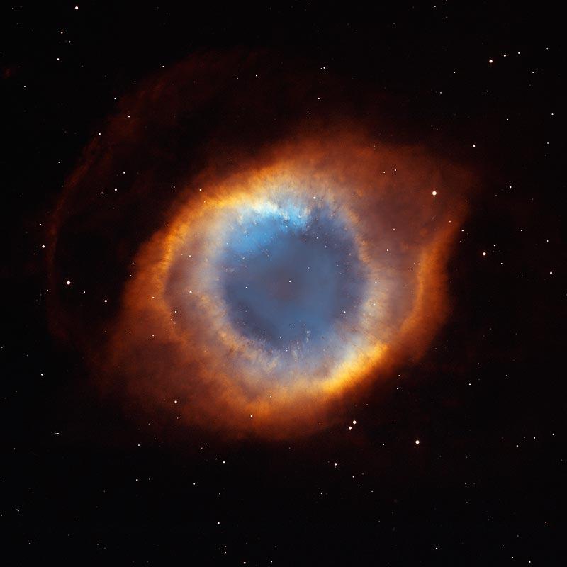 nebulae: the Ring Nebula (M57), left, and the Helix Nebula, right. Gas has been ejected from a hot, evolved star and the ultraviolet radiation from the star ionises the gas.