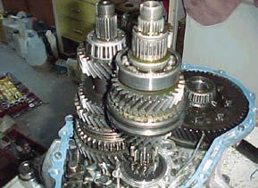 A helical cast steel gear with 30 helix angle has to transmit 35 kw at 000 r.p.m. If the gear has 5 teeth, find the necessary module, pitch diameters and face width for 0 full depth involute teeth.