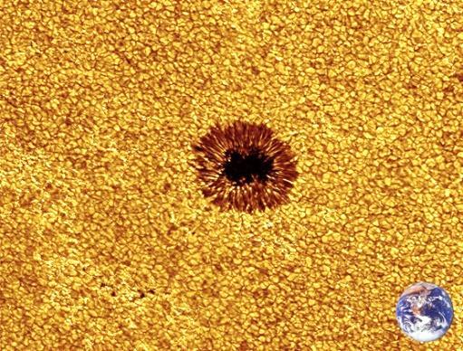 Figure 5: Pictures of sunspots. The one to the right is a close-up image of one spot, with the size of the Earth in comparison.