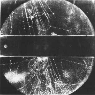 Strangeness. Who ordered that? Finding strange particles Rochester & Butler (1947): Cloud chamber experiment with cosmic rays. Unusual fork of a π + and a π.