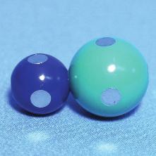 The sodium (blue atom) and chloride (green atom) ions, when bonded together, represent table salt. Six magnets are embedded in each.