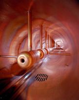 Resonance Accelerators: Linear Accelerator Accelerates particles along a linear path using resonance principle A series of metal tubes are located in a vacuum vessel and connected successively to
