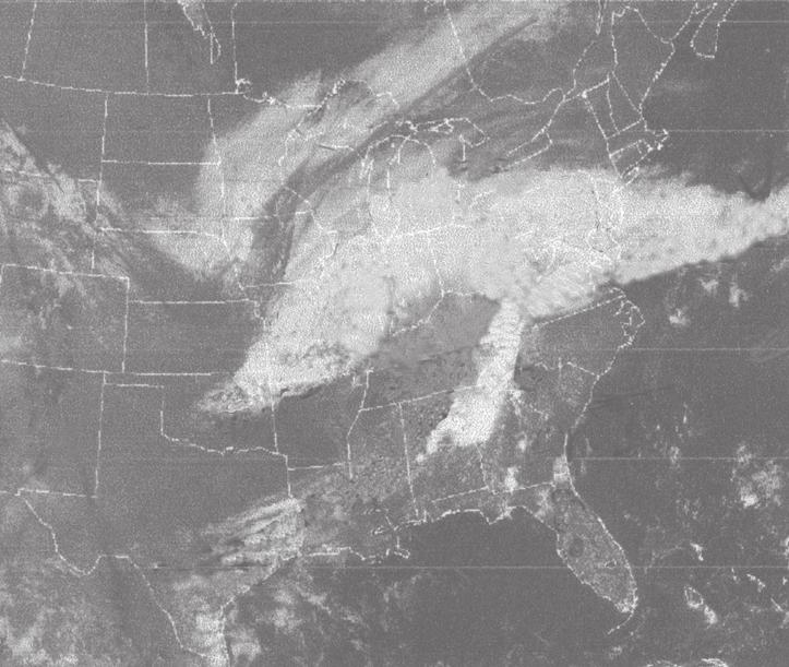 ase your answers to question 19 through 23 on the satellite image shown below. The satellite image shows a low- pressure system over a portion of the United States.