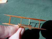 If the wing surface is twisted or warped, your aircraft will spin or turn to