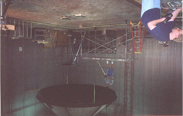 The experiments were conducted in the combustion chamber at the RMSC in Missoula Montana The burn surface of the chamber is about 10 m square The smoke stack of the burn chamber is about 40 m high