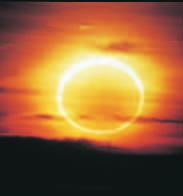 Figure 28-23 This annular eclipse, partly obscured by clouds, was photographed in San Diego, California, in January, 1992.