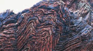 Intrusions An intrusion is molten rock from Earth s interior that squeezes into existing rock and cools.