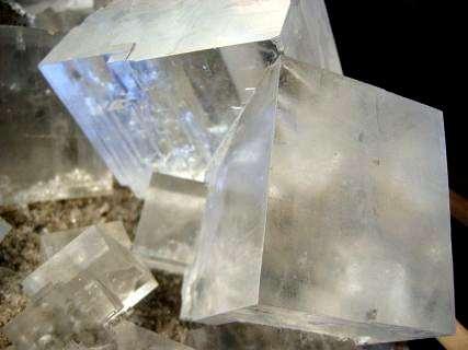 Ionic compounds form from the inside out as solid crystals.