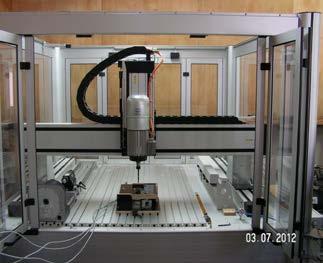 Machine tool and measuring device: a - CNC processing centre type ISEL GFV/GFY; b - Device built for