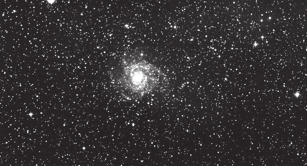 68 Chapter 6 Figure 6-5. Face-on galaxy IC 32 has a bright core surrounded by a large, faint halo with many foreground stars superimposed. Martin C.