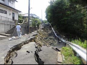 Figure 10: Slope failure in Taiyo New Town: collapsed portion of a road; and house precariously hanging on top of a failed slope.