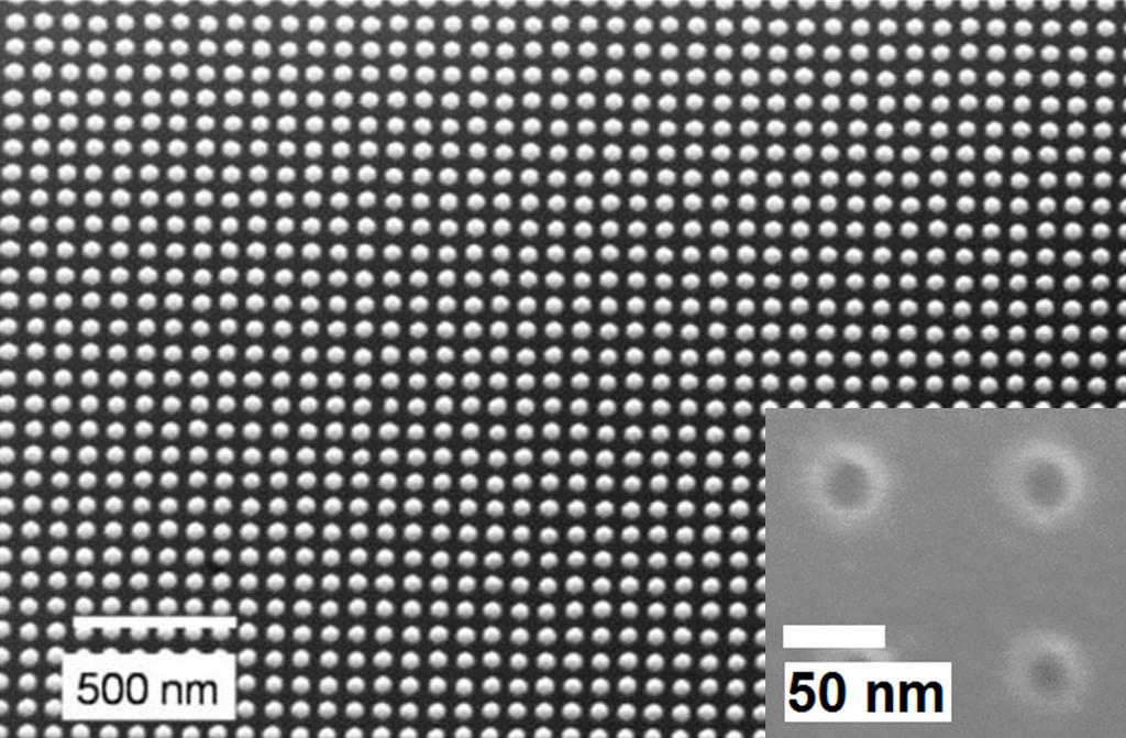 (SEM; Nova Nanolab) of a typical GaN nanodot array after the deposition of 40-nm-thick GaN during SAE. The base diameter distribution of the nanodot array has a mean of 51.