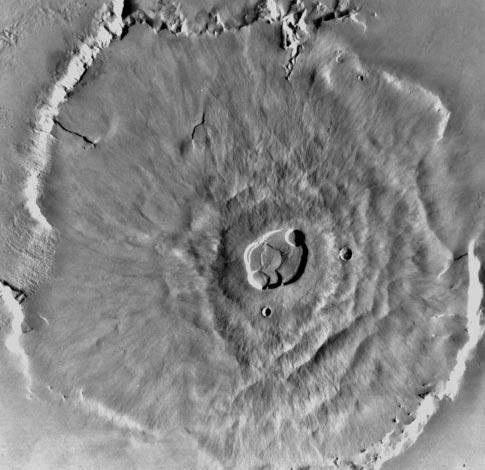 16. A. How is Roter Kamm crater different from the volcanic landforms of Figures 1 and 2? B. How do they look similar?