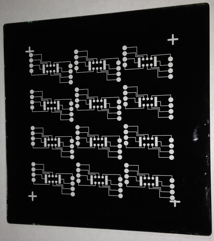 14 Figure 2.2 - A completed photomask with the microelectrode array design. 2.1.4 Photoresist deposition AZ9260 photoresist was spin coated onto the glass sheets at 2500rpm for 30 seconds.