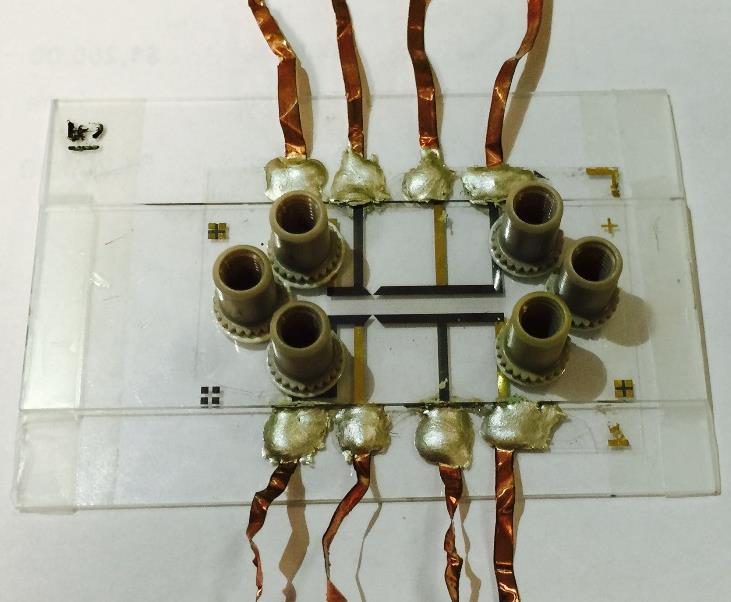 39 Figure 3.12 - A picture of a completed TWE device highlighting the silver epoxy connections. 3.5 