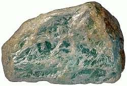 Talc (soapstone rock) results from contact metamorphism (metasomatism): 1) when heated waters carrying dissolved magnesium and