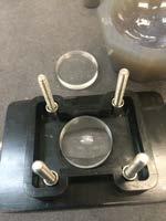 Transfer the sample to the NaCl discs, and spread carefully. Secure the discs in the liquid sample holder. Sample Measurement 1. Once the background scan is completed.