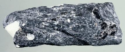 Silicate Minerals - Amphiboles Two directions of cleavage, not at 90 o Narrow, elongated crystals Typically dark
