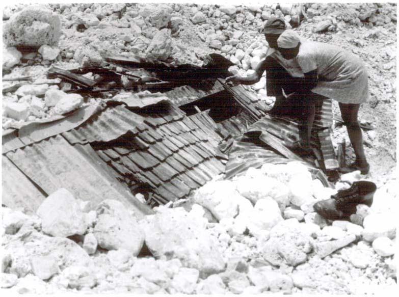 1979 FLOOD RAINS IN WESTERN JAMAICA: House at Bluefields almost completely buried as a result of debris flow; Source: The Jamaica Information Service, Photo Library.